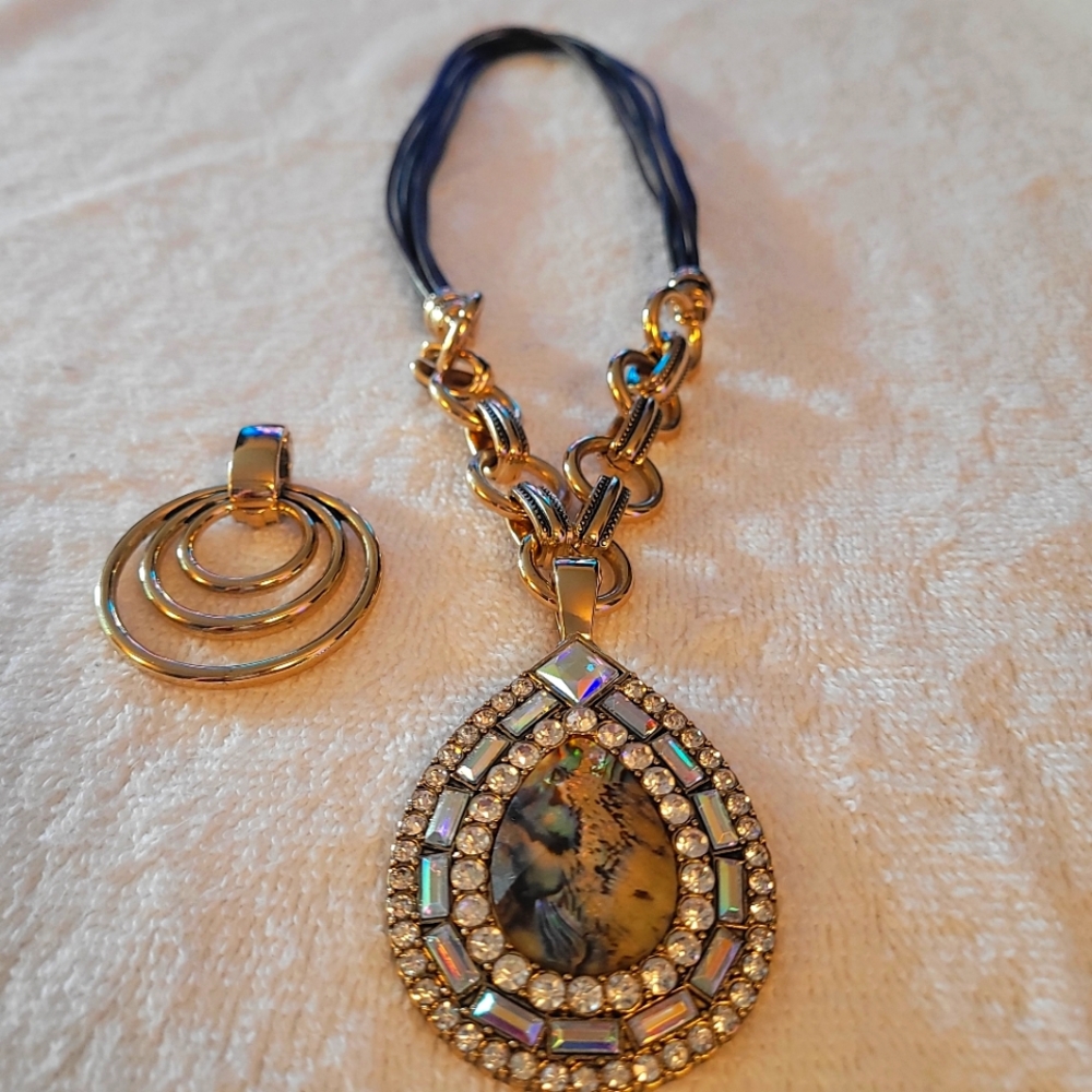 Necklace with extra piece